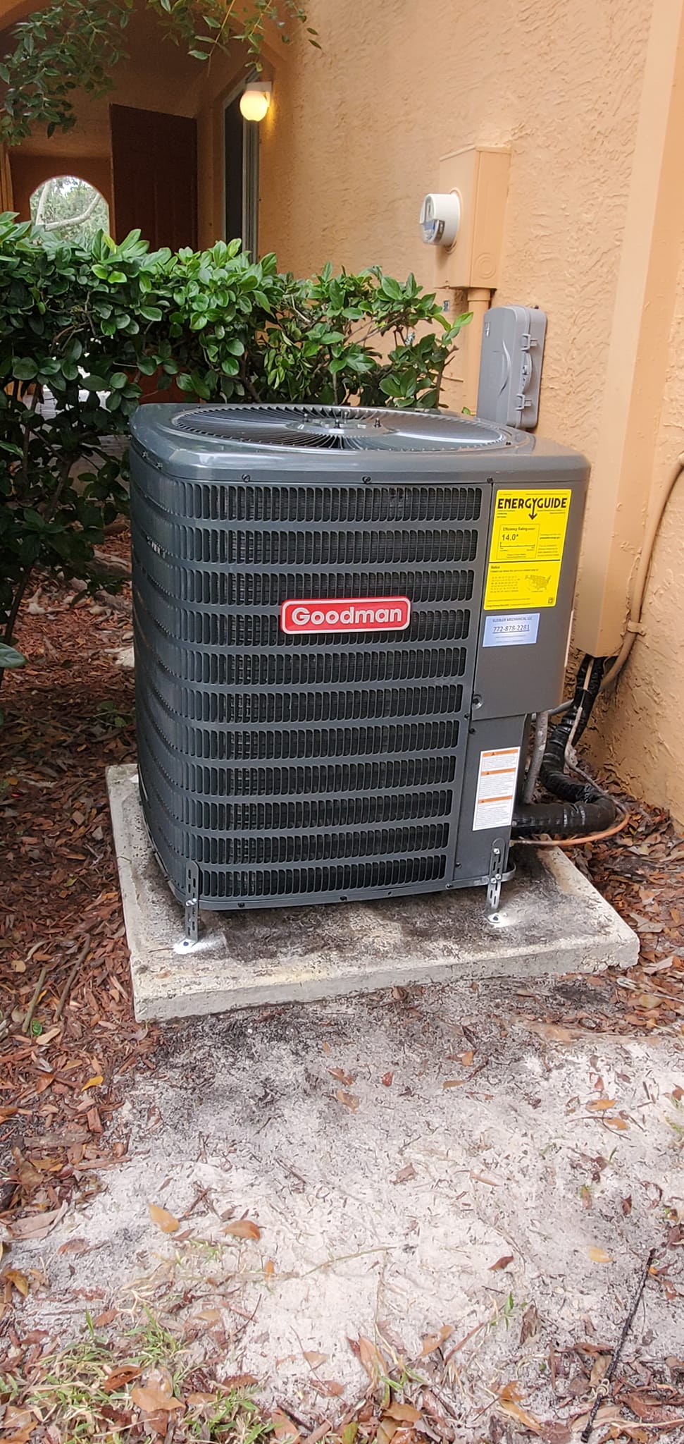 Residential HVAC unit outside home